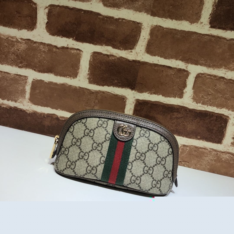 G*u*i clutch bags